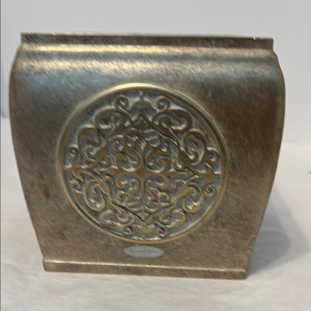 Raymond Waters Elegant Gold tissue holder. 5 inches on top 5 1/2 inches across.